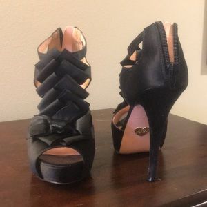 Black platform pumps